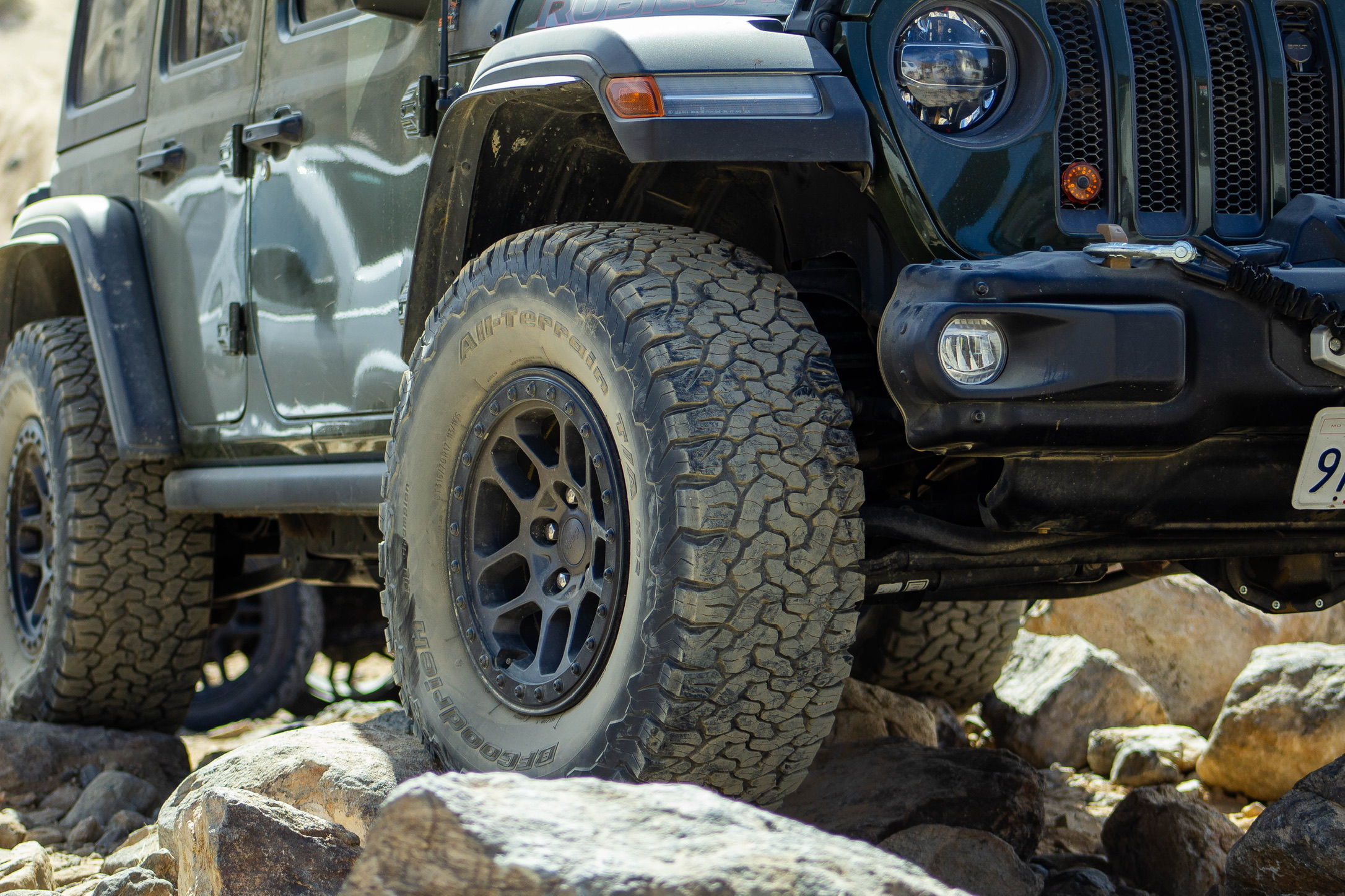 Image of a Jeep Wrangler BFG Tire as the main focus